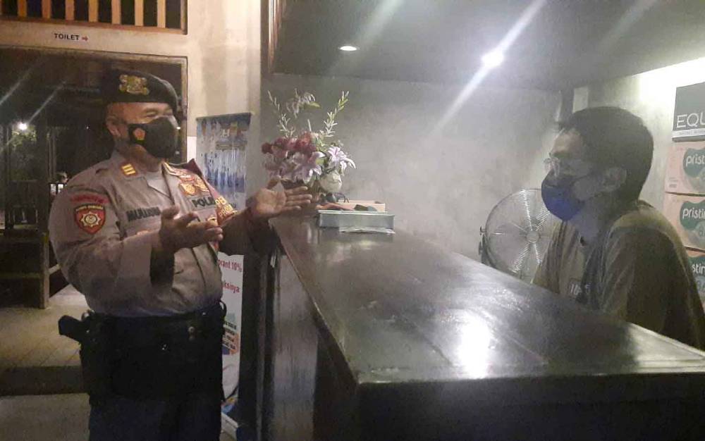 Polres Gunung Mas Ingatkan Pelaku Usaha Disiplin Prokes