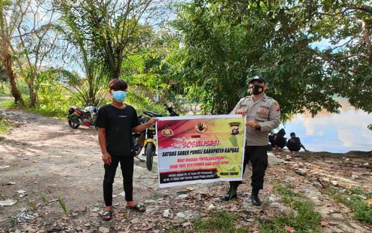 Polsek Timpah Gencar Imbau Warga Cegah Pungli