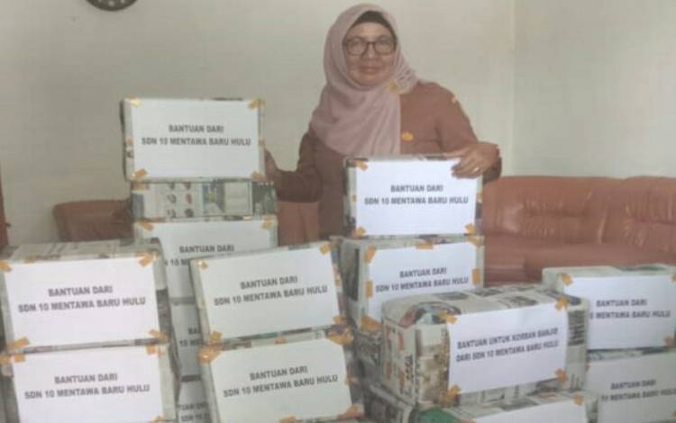 SDN 10 MB Hulu Beri Bantuan Korban Banjir di Kotim