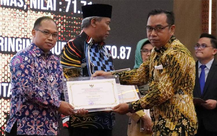 Gunung Mas Raih Peringkat Dua PPID Utama Kategori Cukup Informatif dari Komisi Informasi Kalteng