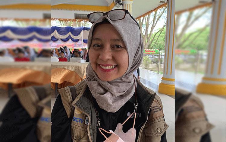 Relawan Berkerudung Itu Mitra Setia Panitia Hari Pers Nasional