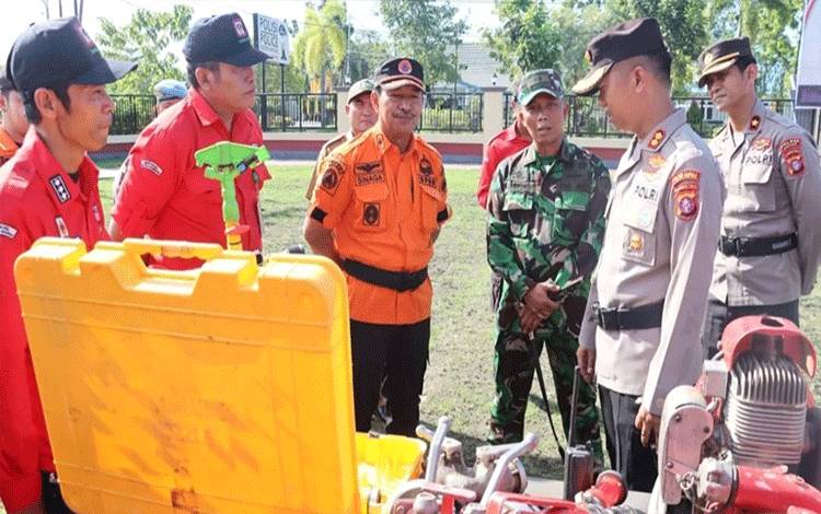Kapolres Kapuas Pimpin Apel Gelar Pasukan dan Sarpras Penanggulangan Karhutla?