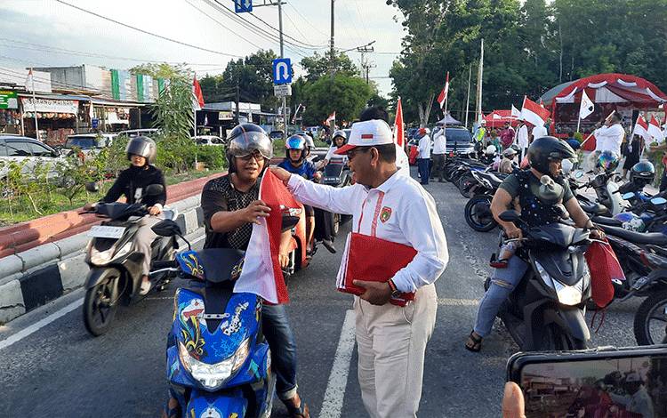 Apresiasi Gerakan Pembagian 10 Ribu Bendera Merah Putih kepada Masyarakat