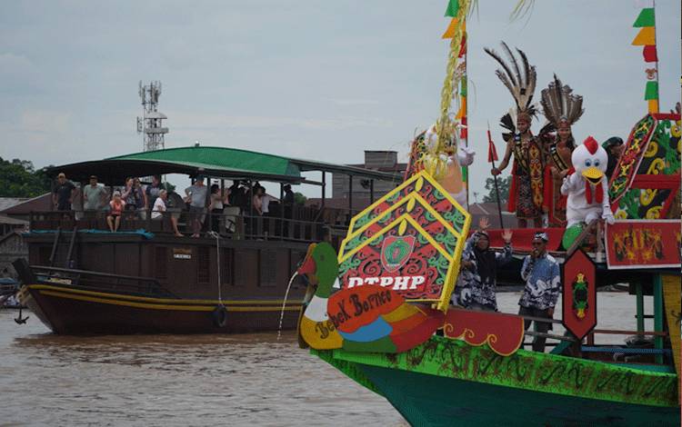 Lomba Perahu Hias FBIM 2024 sebagai Magnet Pertumbuhan Ekonomi dan Pariwisata
