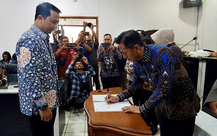 Pemkab Barut, Perbankan dan Kantor Pos Laksanakan Penandatanganan Nota Kesepakatan Bersama