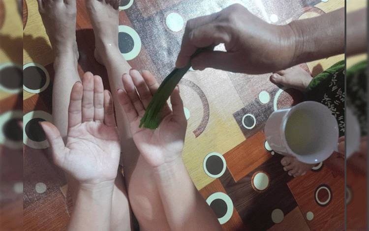 Ritual Tampung Tawar Perlindungan Tolak Bala