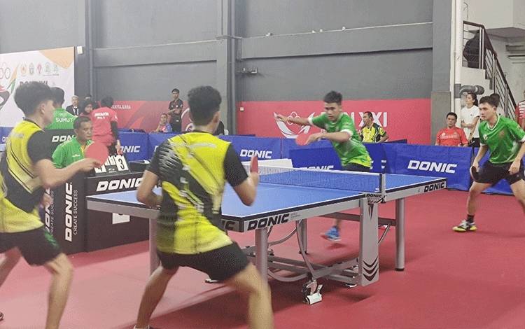 Ganda Putra Tenis Meja Kalteng Tumbangkan Kalsel dalam Derbi Kalimantan di PON XXI