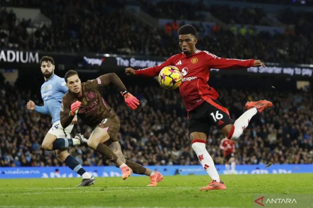 Arsenal Curi Satu Poin dari Manchester United