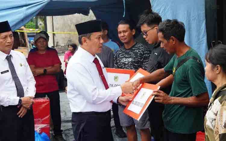 Pj Bupati bersama Sekda Barito Utara Tinjau Lokasi Kebakaran di Cempaka Putih