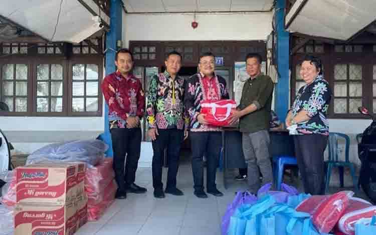Dinas Sosial Salurkan Bantuan Tanggap Korban Kebakaran Desa Sei Hanyo