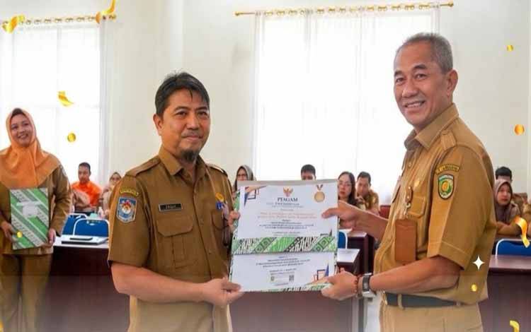 Bapperida Palangka Raya Sabet Penghargaan Disiplin Kearsipan