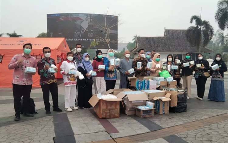 GOW Palangka Raya Bagikan 50.000 Masker di Bundaran Besar Palangka Raya