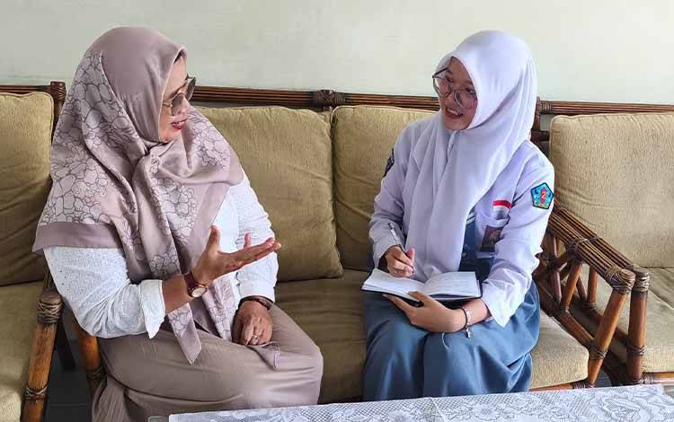 Karya tentang Karungut dan 1.000 Pelajar Antar Siswi SMAN 2 Kapuas Raih Juara Nasional
